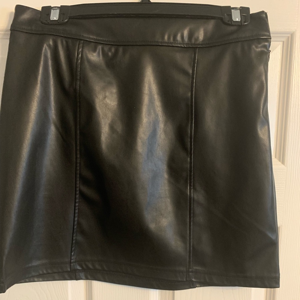 Black leather mini skirt